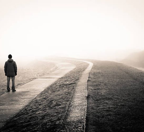 lonely man loosing the way on a foggy day. lonely man loosing the way on a foggy day.